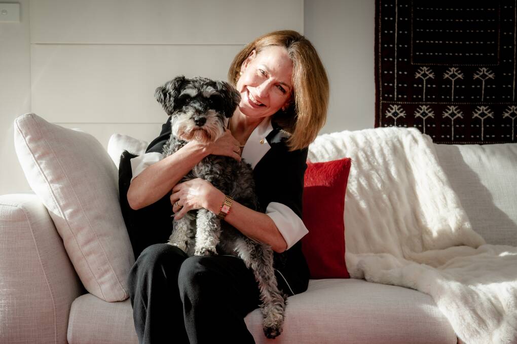 Virginia Haussegger, pictured with dog Vincent, said getting vaccinated was part of her 'civic responsibility'. Picture: Elesa Kurtz