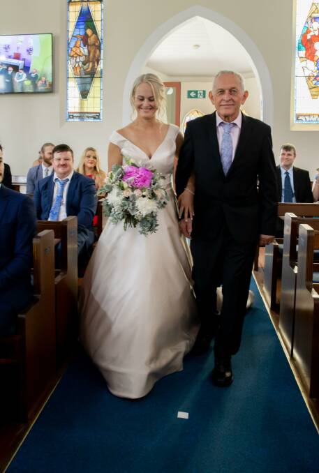 Peter Fotheringham threw away his walking sticks two days before daughter Kate's wedding. Photo: supplied