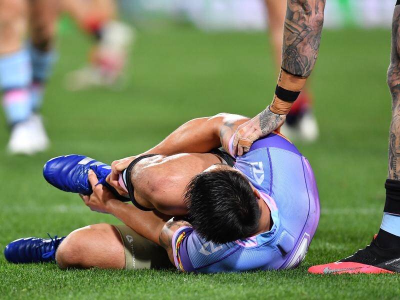 Shaun Johnson's season for Cronulla is over after suffering an Achilles injury against the Roosters.