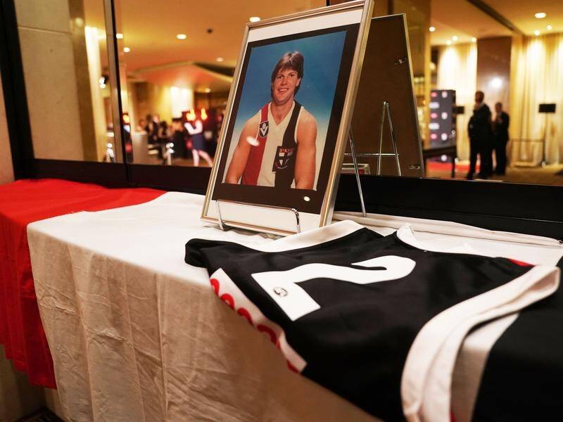 A tribute to former Saints player Danny Frawley is seen during the club's presentation night.