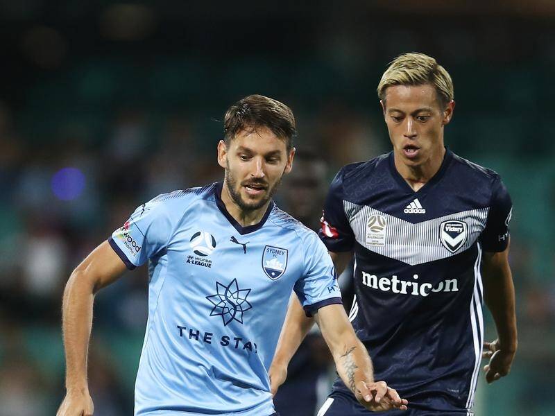 Milos Ninkovic (l) scored Sydney FC's late winner in the A-League victory over Melbourne Victory.