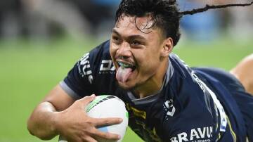 Jeremiah Nanai of the Cowboys celebrates a try in his side's big win over the Warriors. (Scott Radford-Chisholm/AAP PHOTOS)