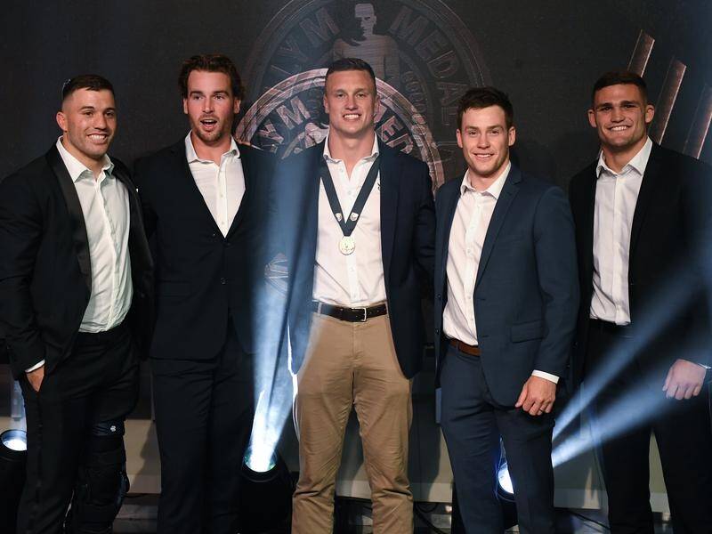 Canberra five-eighth Jack Wighton (centre) is the Dally M Medal winner for the 2020 NRL season.