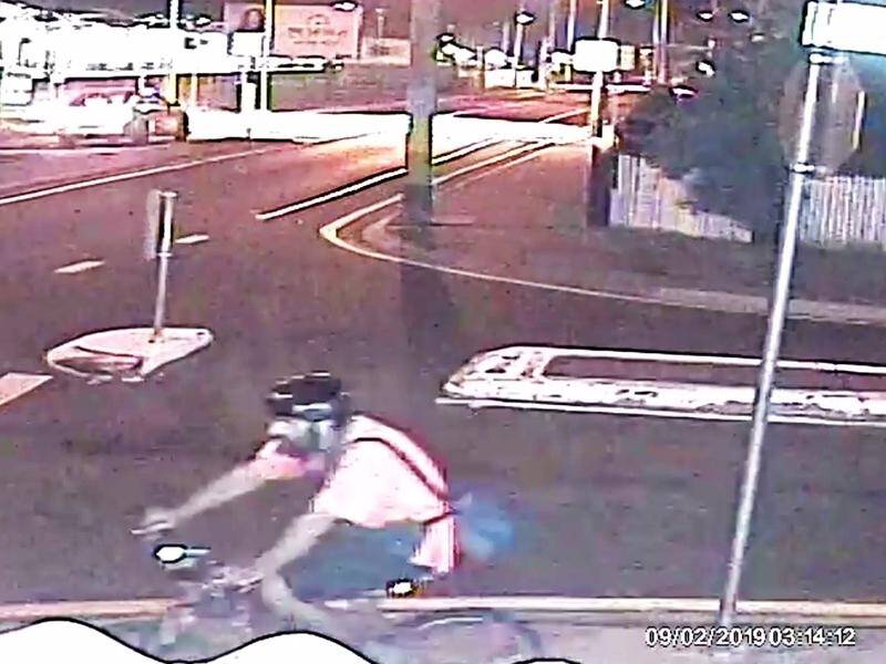 Queensland police have released footage of a man riding a bike near where a woman was shot dead.