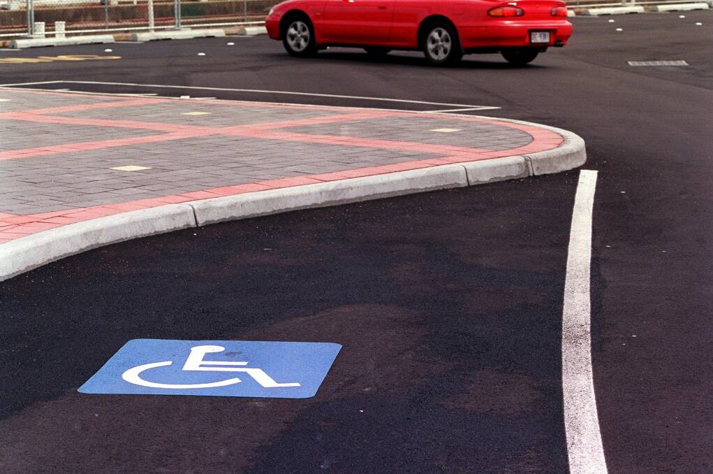 Demerit points for parking in disabled spots