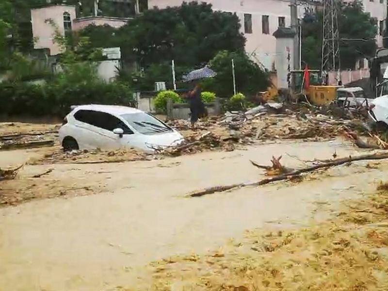 Heavy rains since earlier this month in China have left at least 49 people dead.