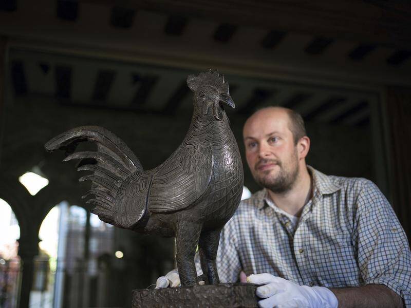 The bronze statue of a cockerel was one of the Benin bronzes looted by British troops.