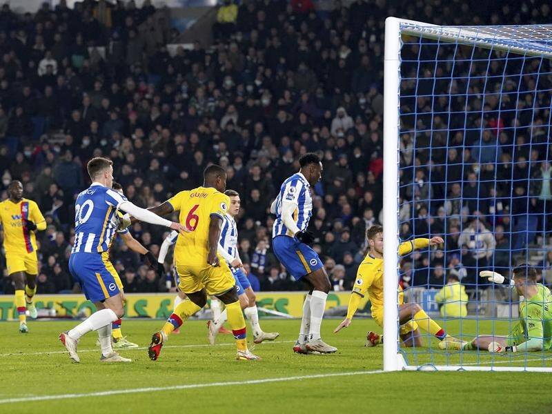 Crystal Palace's Joachim Andersen (2-r) scores an own goal in their 1-1 EPL draw with Brighton.