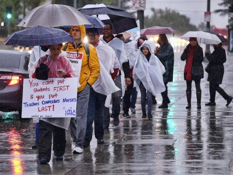 LA teachers have joined picket lines in the US' second-largest school district over a wage dispute.