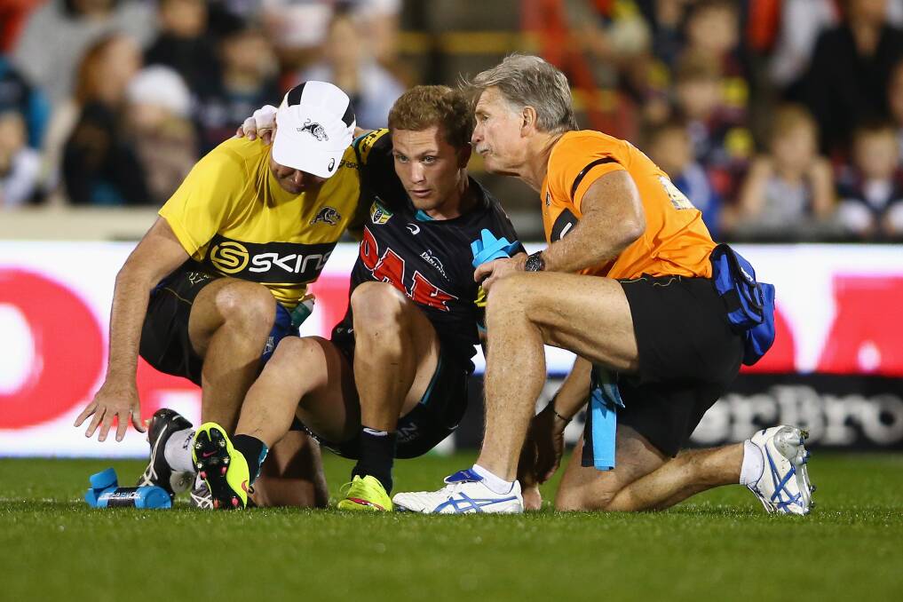SYDNEY, AUSTRALIA - MAY 29:  Matt Moylan of the Panthers is helped to his feet before leaving the field with an injury during the round 12 NRL match between Penrith Panthers and the Parramatta Eels at Pepper Stadium on May 29, 2015 in Sydney, Australia.  (Photo by Mark Kolbe/Getty Images)