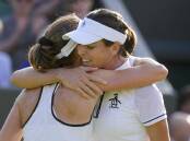 Australia's Ajla Tomljanovic (right) hugs Alize Cornet after her Chris Evert-inspired Wimbledon win.