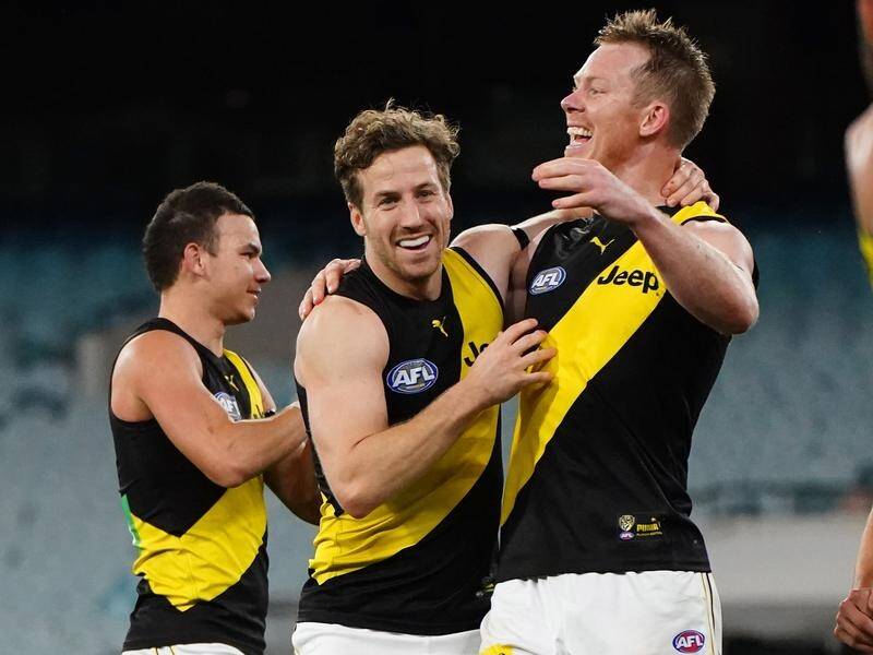 Richmond's Kane Lambert said they have got back to doing the basics right in recent AFL wins.