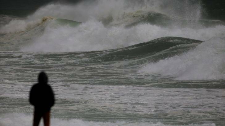 Surfs down: fewer storms will be bad news for keen surfers. Photo: John Veage