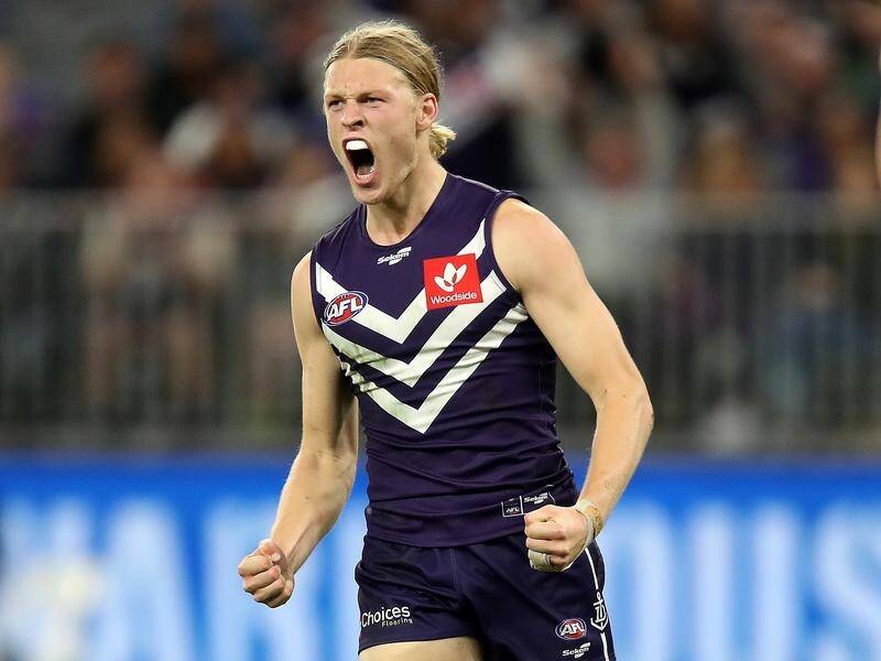 Hayden Young has extended his time at Fremantle, signing with the Dockers for another four years.