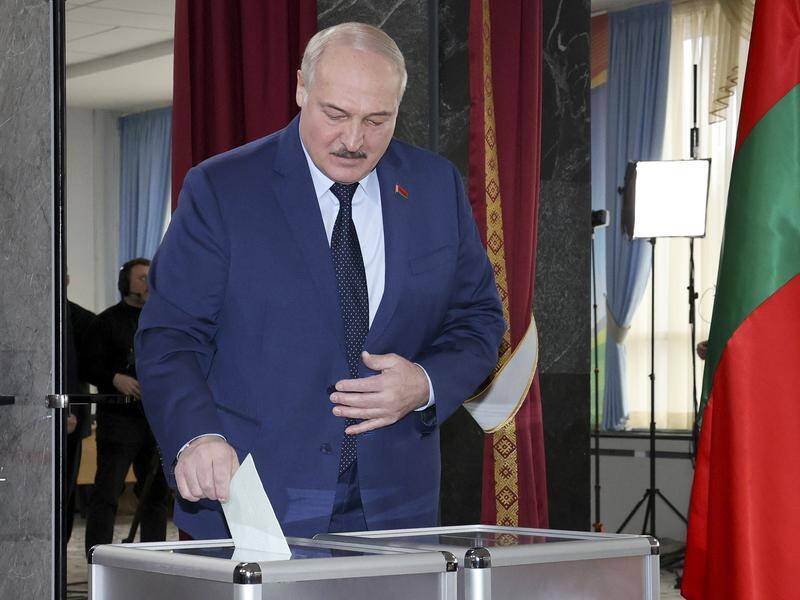 President Alexander Lukashenko votes in a referendum that will ditch non-nuclear status for Belarus.