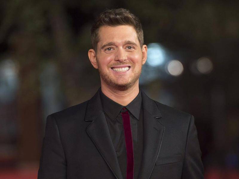Canadian singer Michael Buble says he is not retiring from music, slamming recent rumours.