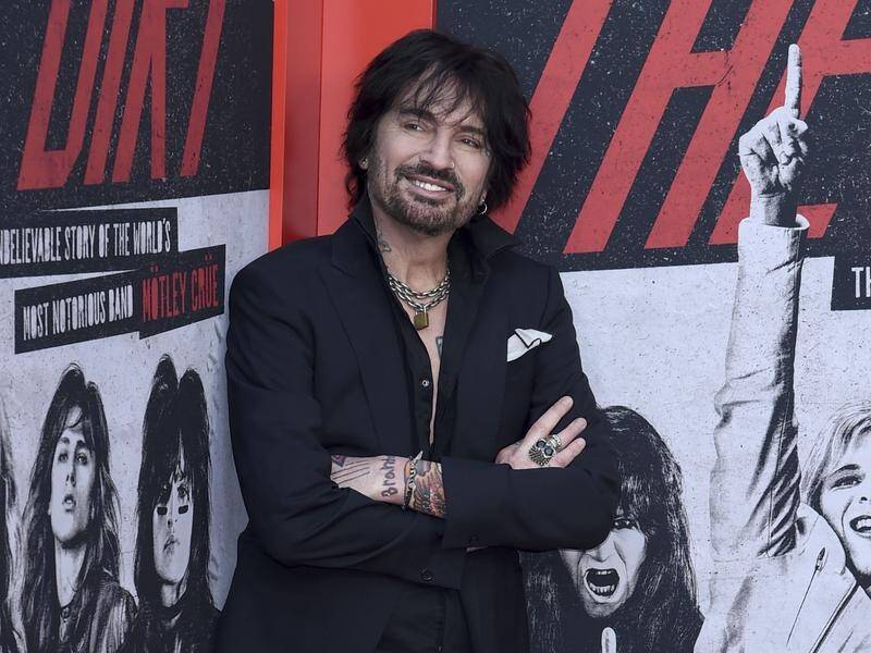 Motley Crue drummer Tommy Lee has been accused of a sexual assault during a wild helicopter ride. (AP PHOTO)