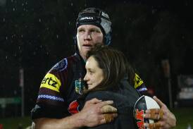 Farewell: An emotional Nigel Plum celebrates with his family after playing his 150th and final NRL game at Pepper Stadium, Penrith on Saturday. Picture: Mark Kolbe/Getty Images