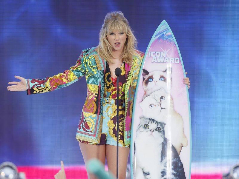Taylor Swift received the first Icon award at the Teen Choice Awards in Hermosa Beach, California.