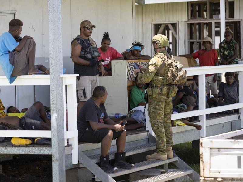 Australian Defence Force troops and police officers were sent to the Solomon Islands amid rioting.