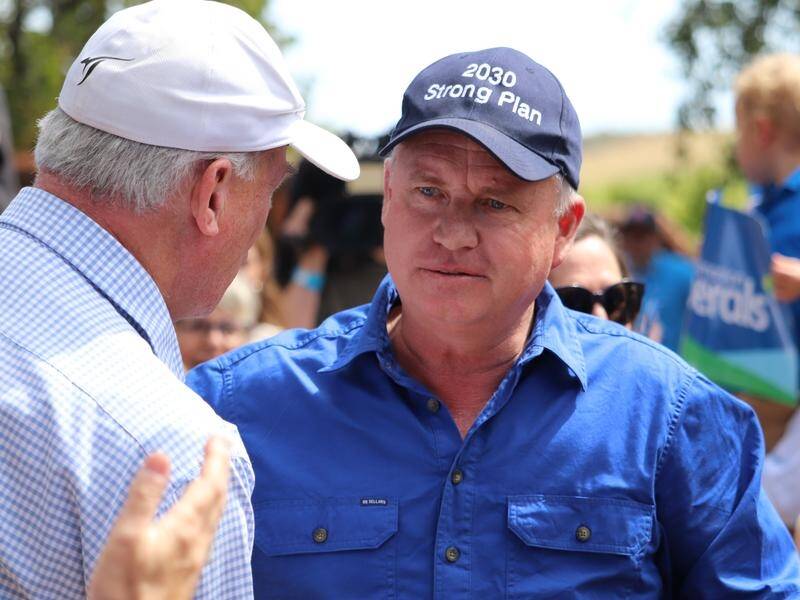 Tasmanian Premier Jeremy Rockliff says he doesn't want any regrets when he returns to farm life. (Ethan James/AAP PHOTOS)