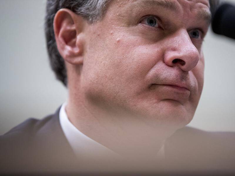 FBI Director Christopher Wray says the US must respond to Russia with fierce determination.