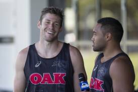 Happy to stay: Jeremy Latimore (pictured during an interview with Tupou Sopoaga) is happy to be staying with the Panthers for the next two seasons. Picture: Geoff Jones . 