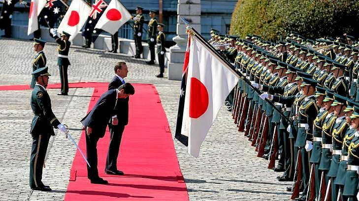 Japanese Prime Minister Shinzo Abe and Prime Minister Tony Abbott during the Welcome Ceremony at the State Guest House in Tokyo. Photo: Alex Ellinghausen