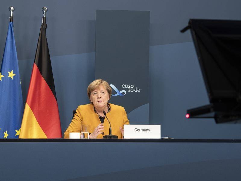 Angela Merkel has marked 15 years as German chancellor while attending the virtual G20 Summit.