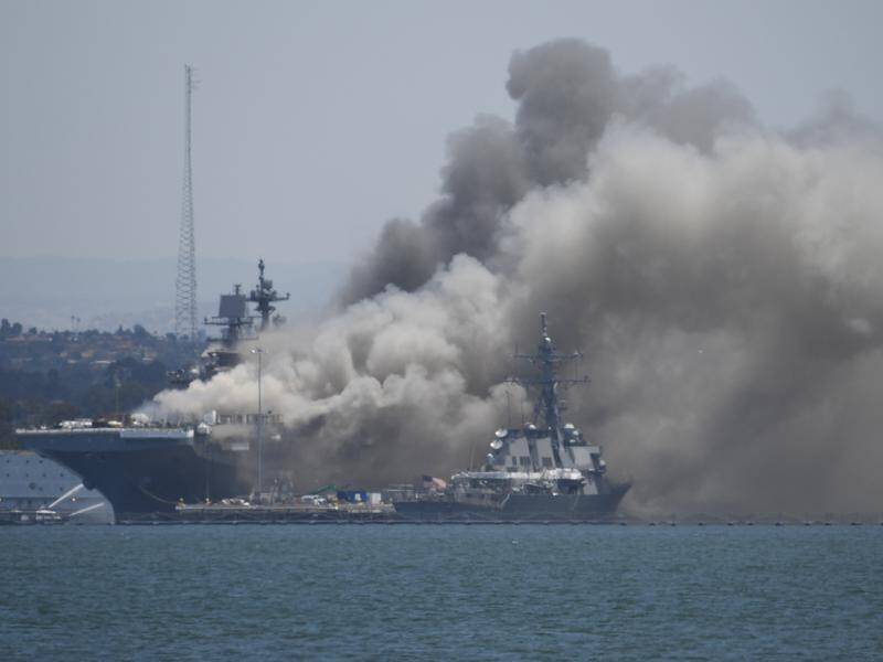 A US military ship has caught fire off San Diego, with 18 sailors believed to have been hurt.