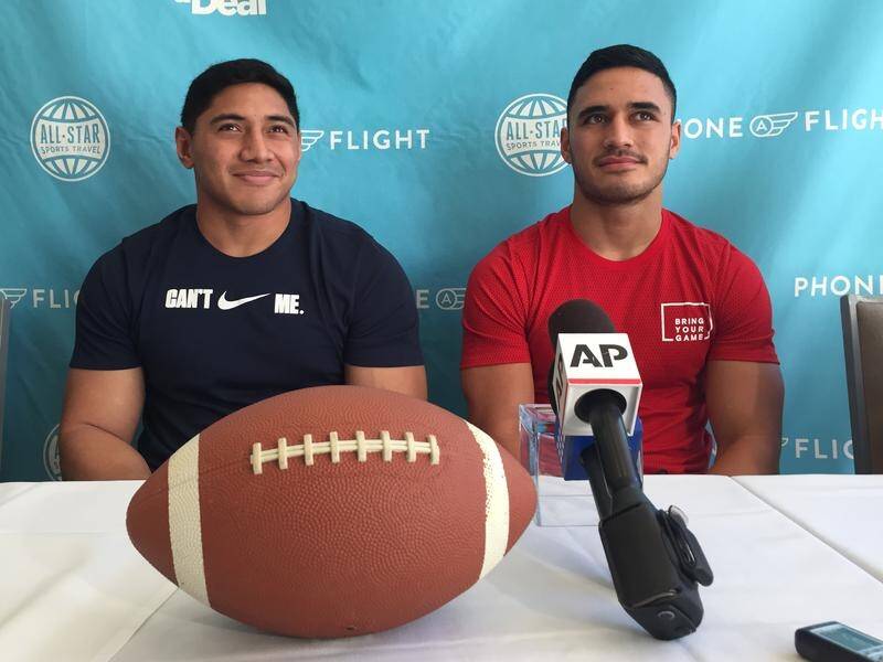 NRL players Jason Taumalolo (left) and Valentine Holmes sought to impress NFL scouts in 2016.