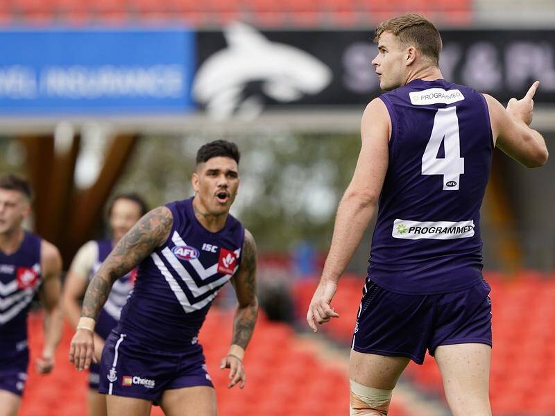 Fremantle have come back to edge St Kilda by six points in an AFL thriller on the Gold Coast.