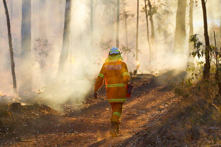 Richmond Vale bushfire. Pic shows RFS firefighters conducting a back burn on Leggetts Drive. Picture: Max Mason-Hubers MMH