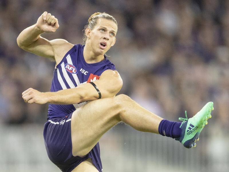 A Nat Fyfe masterclass steered Fremantle to a 54-point AFL victory over the Western Bulldogs.