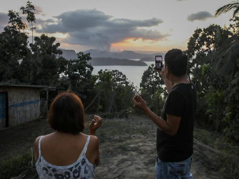 The Taal Volcano in the Philippines spews smoke in Tanauan town in Batangas.