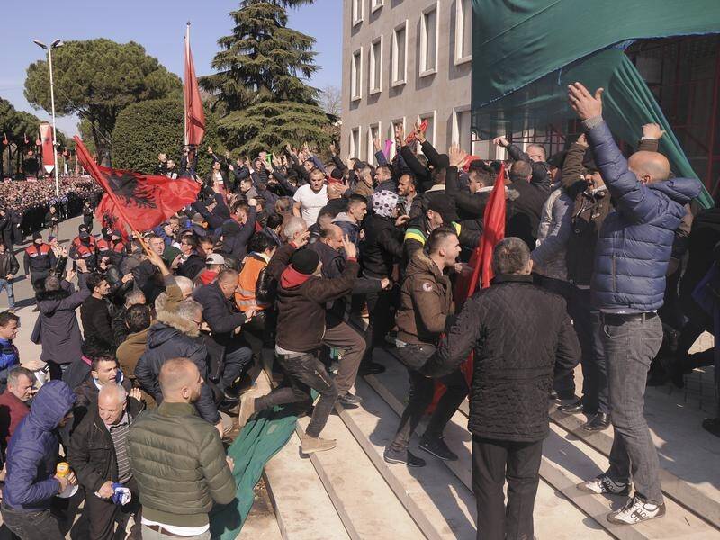 Opposition supporters have attacked the prime minister's office during a rally in Albania's capital.