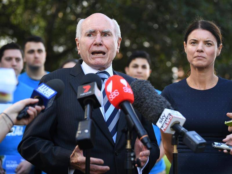 Former PM John Howard brings his star power out in the marginal Liberal Sydney seat of Reid.