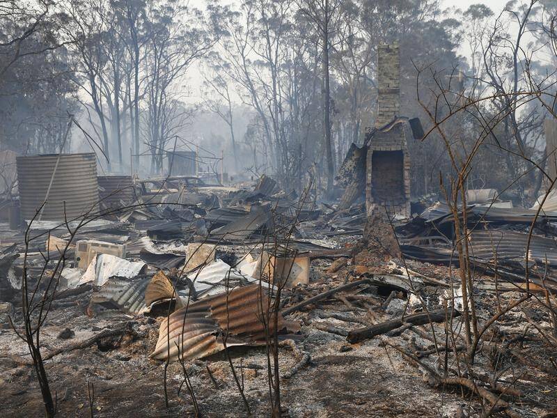 Residents from around Taree in NSW have fled to evacuation centres as bushfires destroys homes.