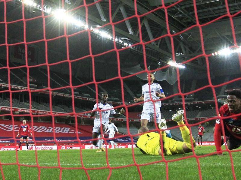Lille have edged Reims with Jonathan David's late goal proving the difference.