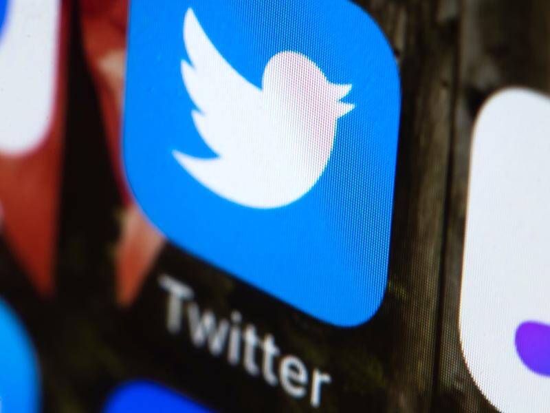 Twitter has suspend two accounts linked to Russian spies accused of interfering in the US election.