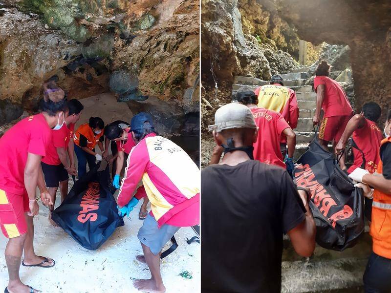 Authorities move the body of Australian Taras Mulik from a Bali beach where he was found dead.
