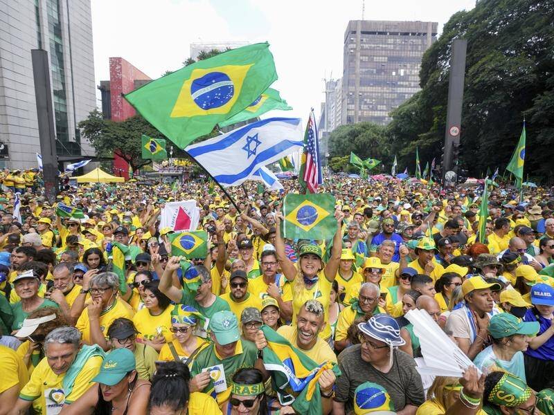 Followers of former Brazilian president Jair Bolsonaro rally to express their support in Sao Paulo. (AP PHOTO)