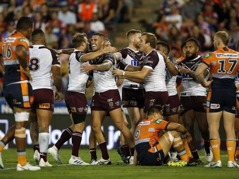 Manly have been too strong for the Knights, winning their NRL clash 26-18 in Newcastle.
