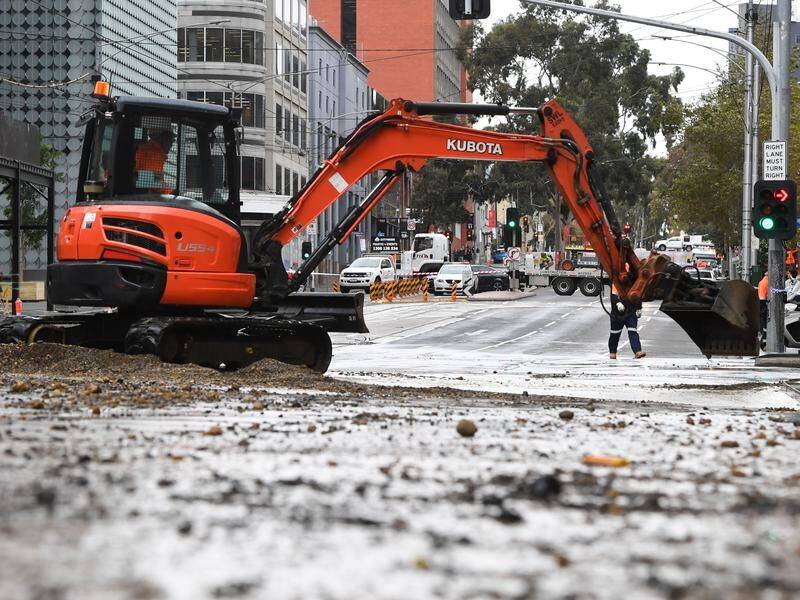 Melbourne's Victoria Street will remain partly closed after flood damage from a burst water main.