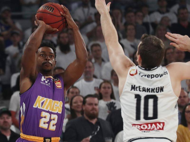 Casper Ware (L) with 28 points has led Sydney to a 104-81 NBL road win over Melbourne United.