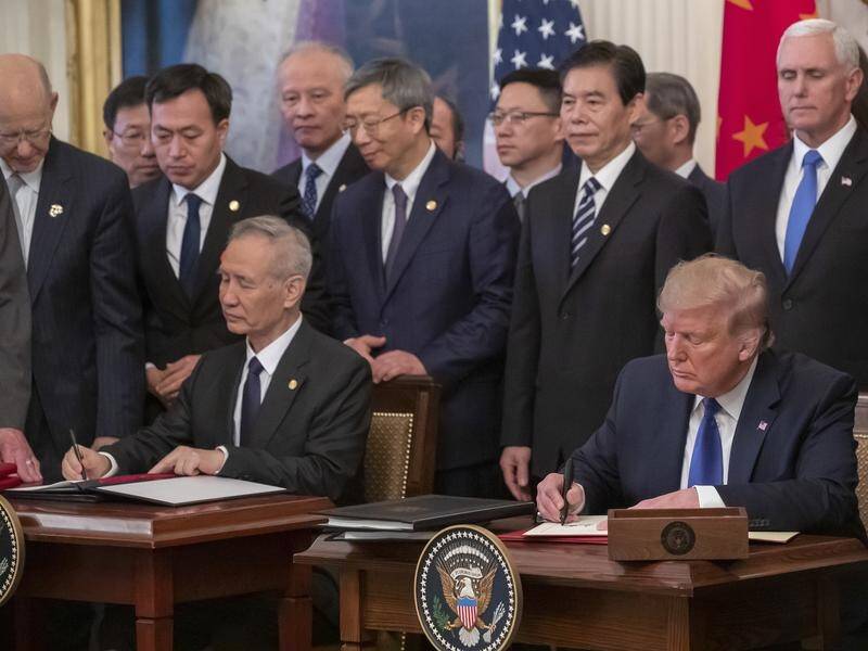 The trade deal will see China importing far more US goods and services, while the US cuts tariffs.