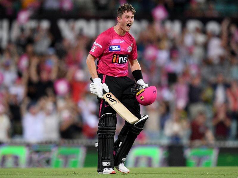 Hayden Kerr roars with delight after his 98no guided the Sixers to the BBL final.