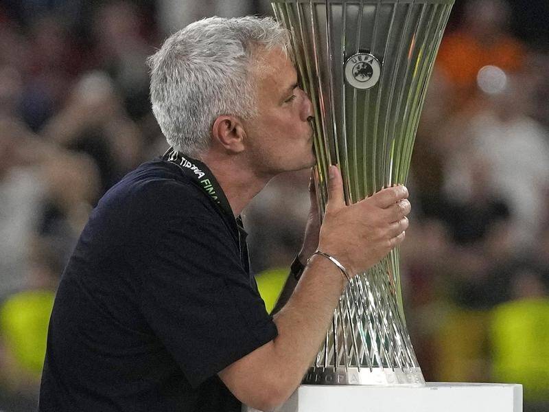 Roma manager Jose Mourinho celebrates another European success after his side beat Feyenoord 1-0.