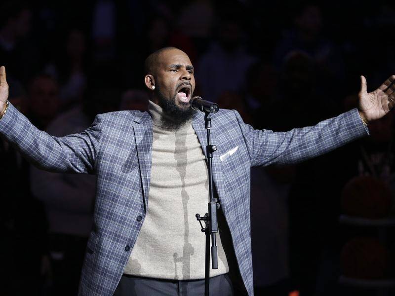 Grammy-winning singer R. Kelly has been charged with the aggravated sexual assault of four people.