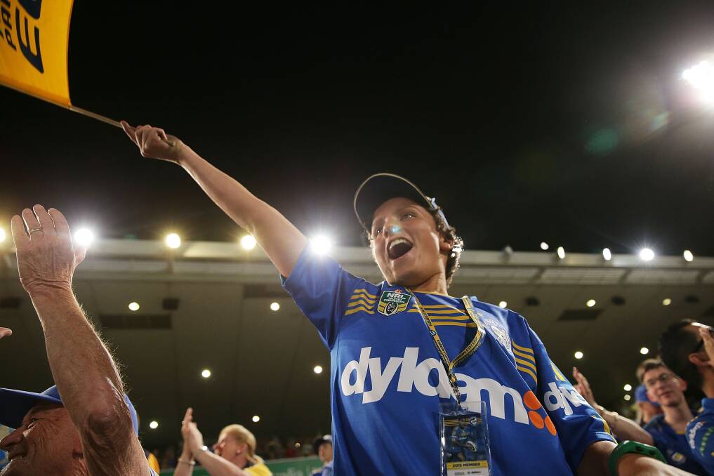 SYDNEY, AUSTRALIA - MARCH 27:  Eels fans celebrate a try during the round four NRL match between the Parramatta Eels and the South Sydney Rabbitohs at Pirtek Stadium on March 27, 2015 in Sydney, Australia.  (Photo by Mark Metcalfe/Getty Images) getty images